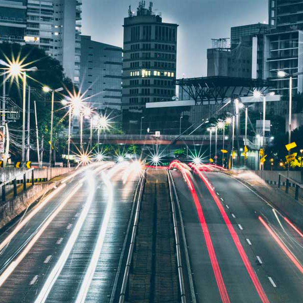time lapse photo of cars in the city