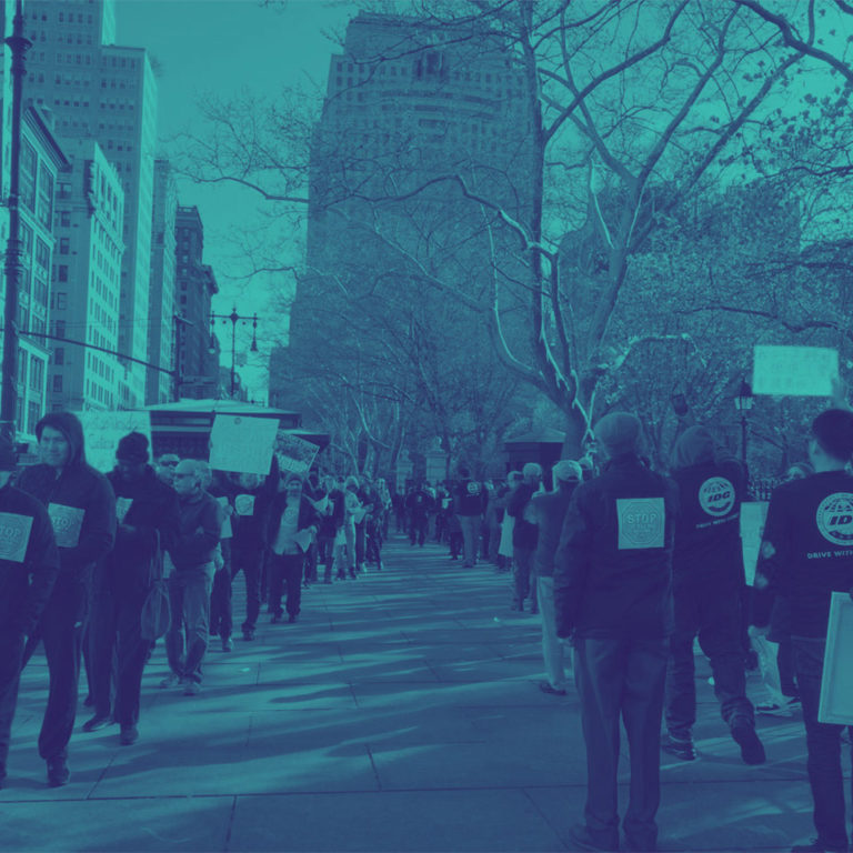 blue and green photo of protest