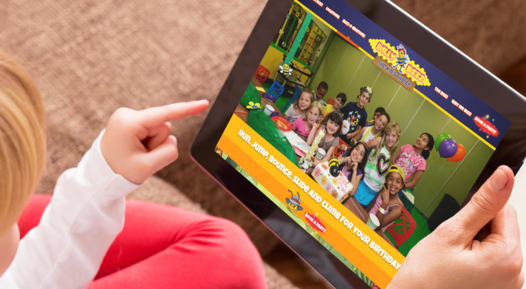 child looking at Billy Beez website on iPad